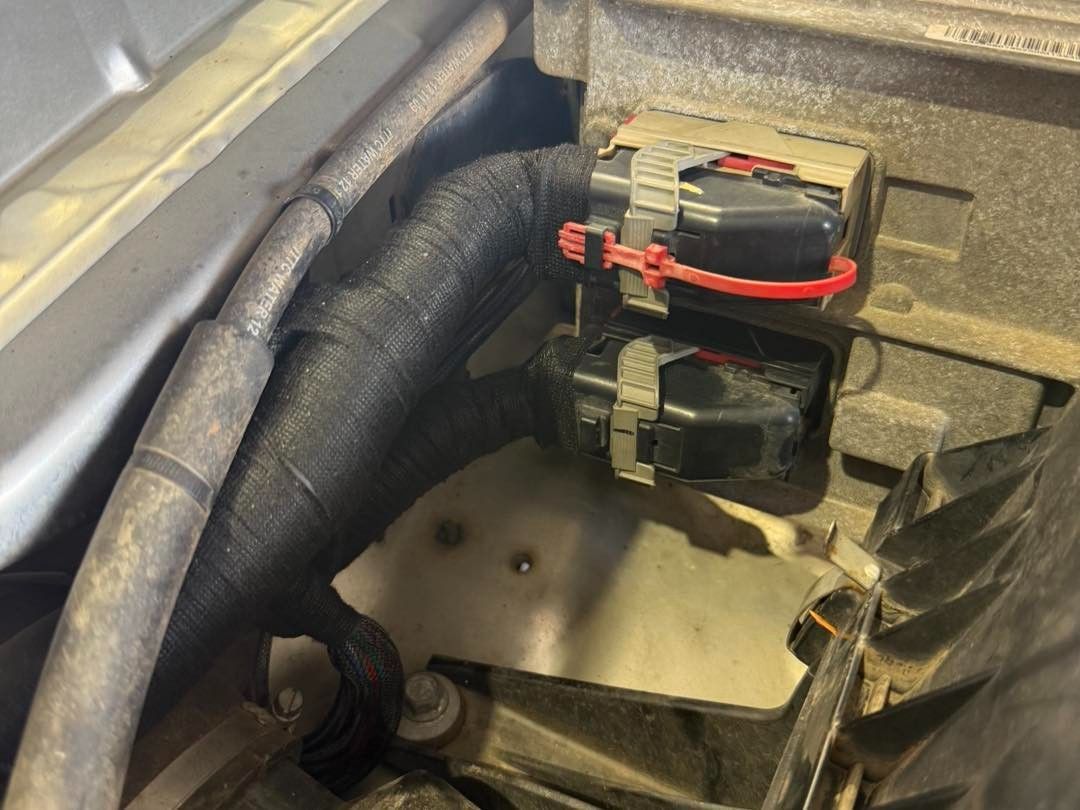 Black Electrical Connectors With Red Safety Clip in Engine Bay — Track N Back 4x4 In Mareeba, QLD