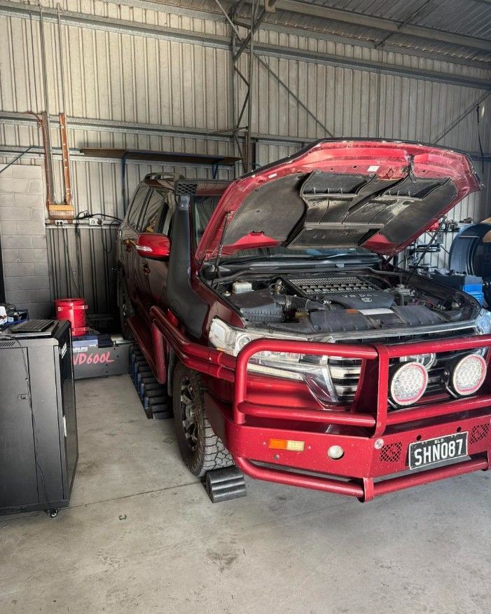 Red Suv With Its Hood Open in a Garage — Track N Back 4x4 In Mareeba, QLD