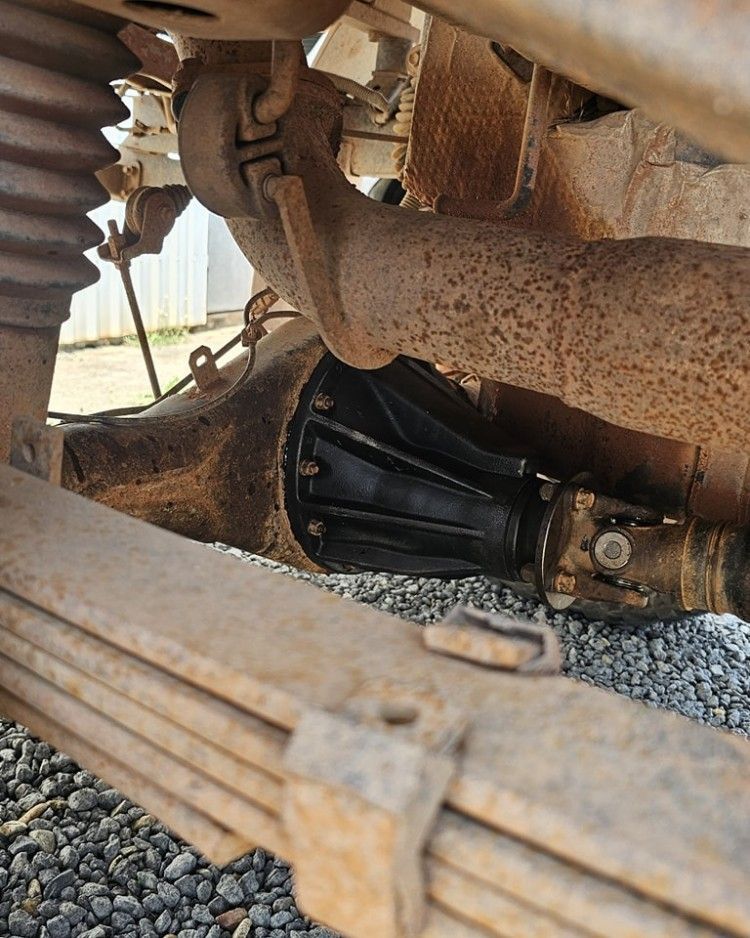 Undercarriage of a Rusty Vehicle, Showing a Black Differential — Track N Back 4x4 In Mareeba, QLD