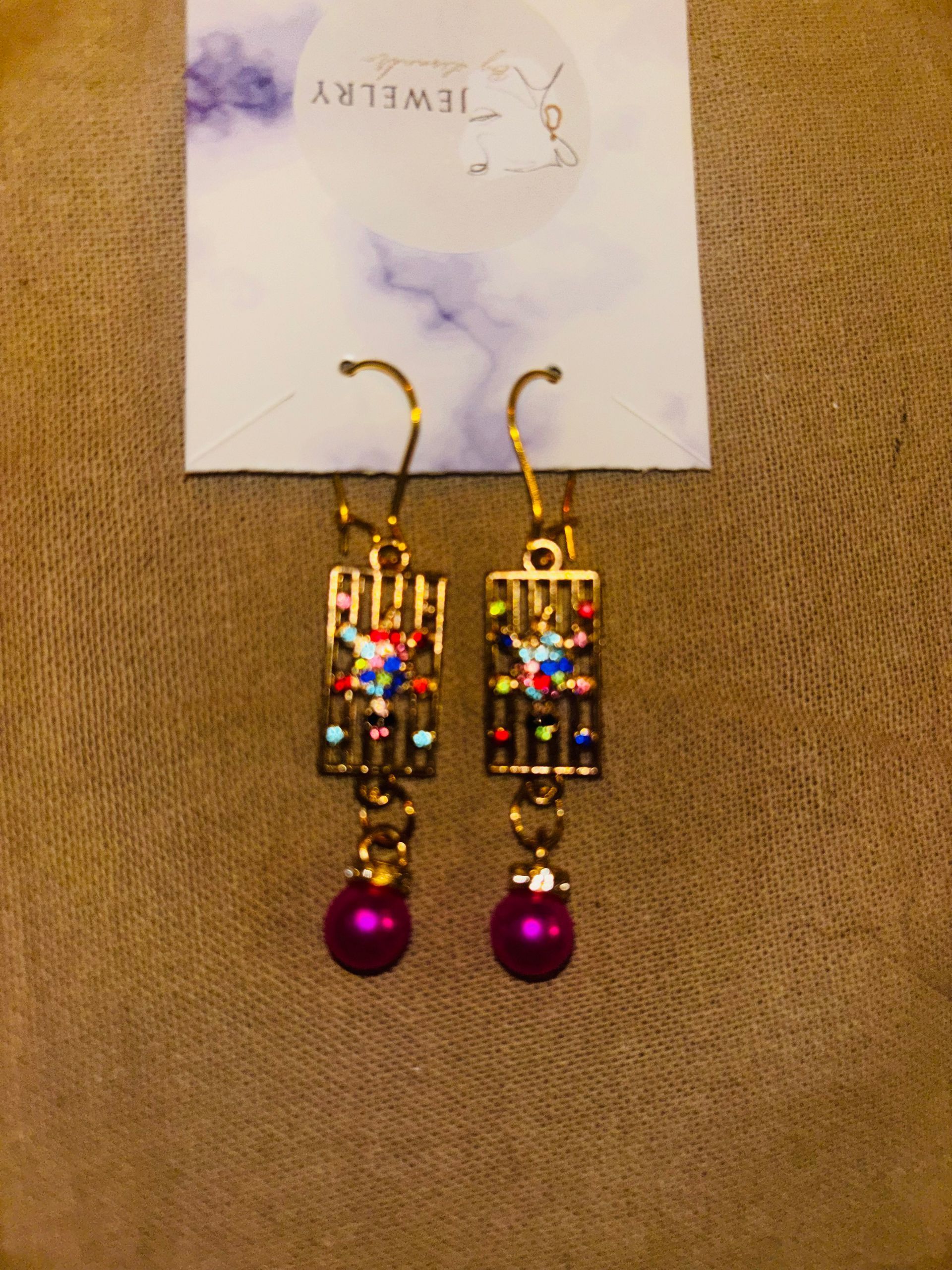 A22 Hanger goud met een roze bal