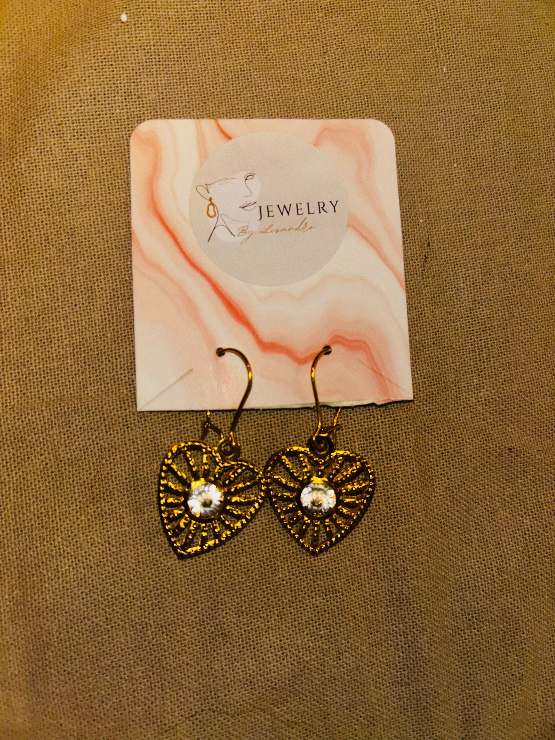 A14 gouden oorbellen hart blanke steen