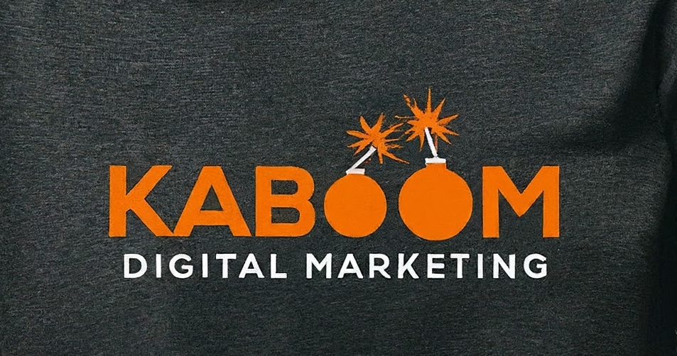 A black shirt that says kaboom digital marketing