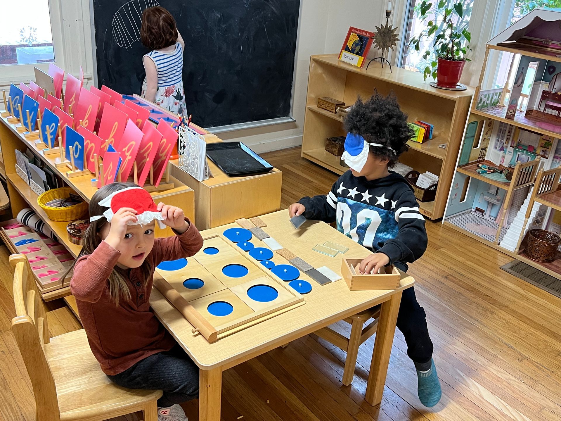 Montessori child working in the classroom