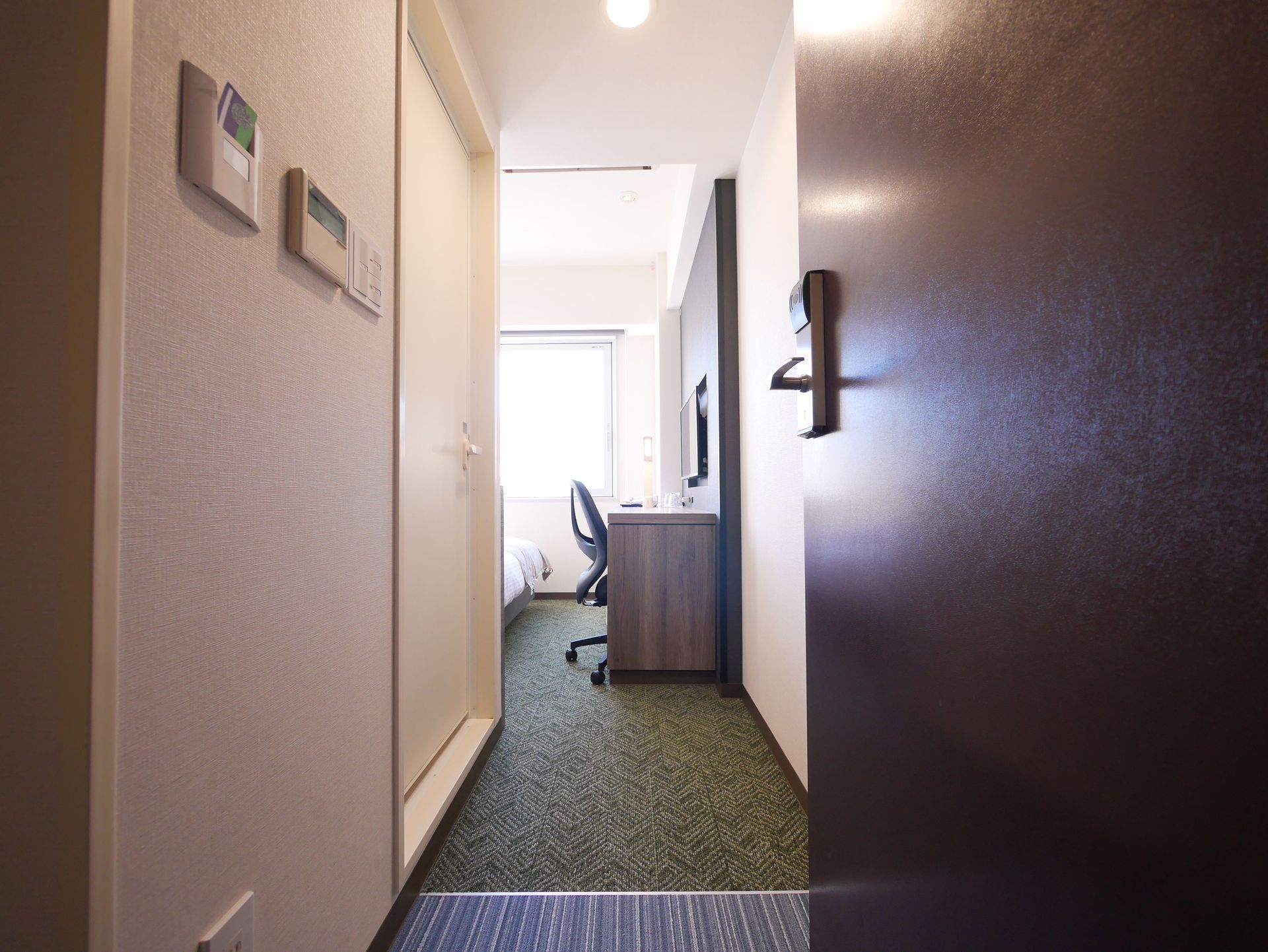 Double room with large bed at Comfybed Ginza Tokyo