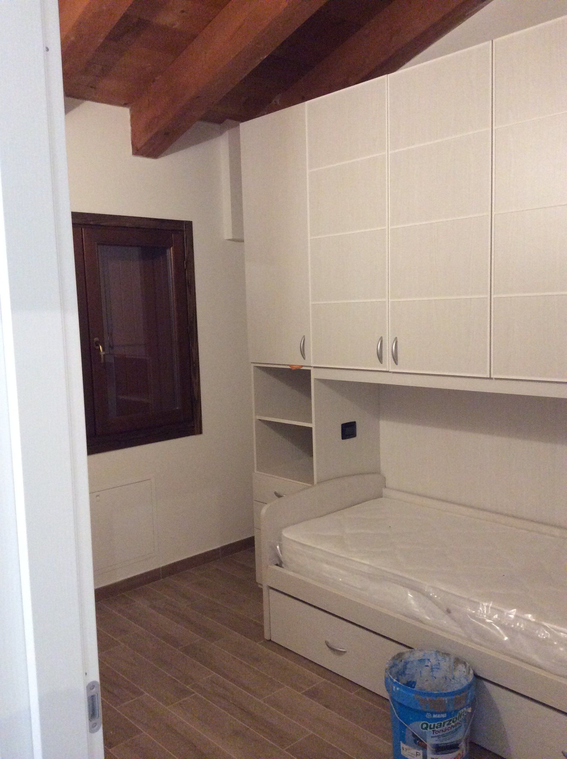 camera da letto dopo fase di ristrutturazione