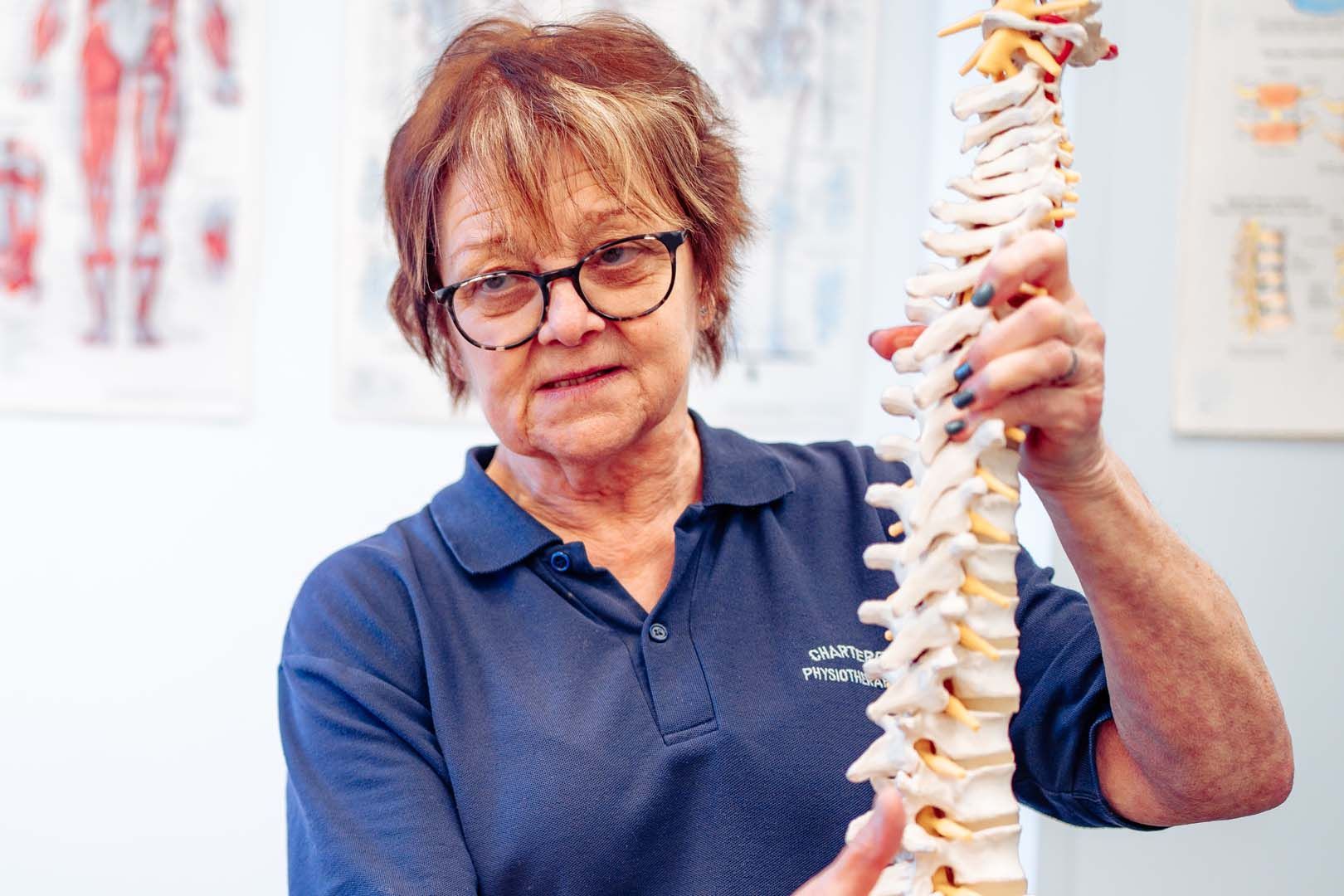 Essex Physiotherapist Lower Back Pain - an image of a woman with lower back pain