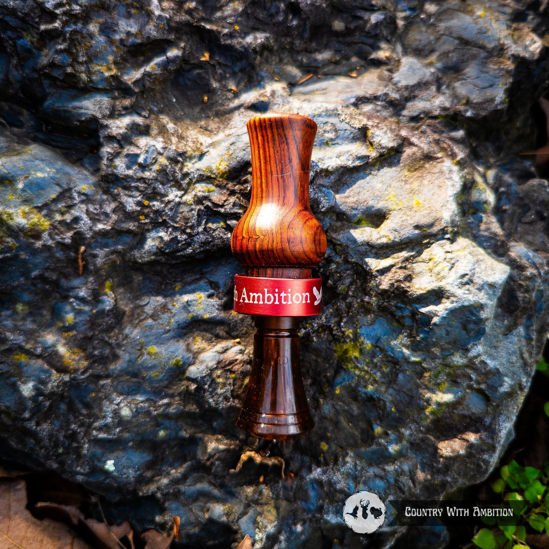 Custom cocobolo hand turned duck call with red Country with Ambition band