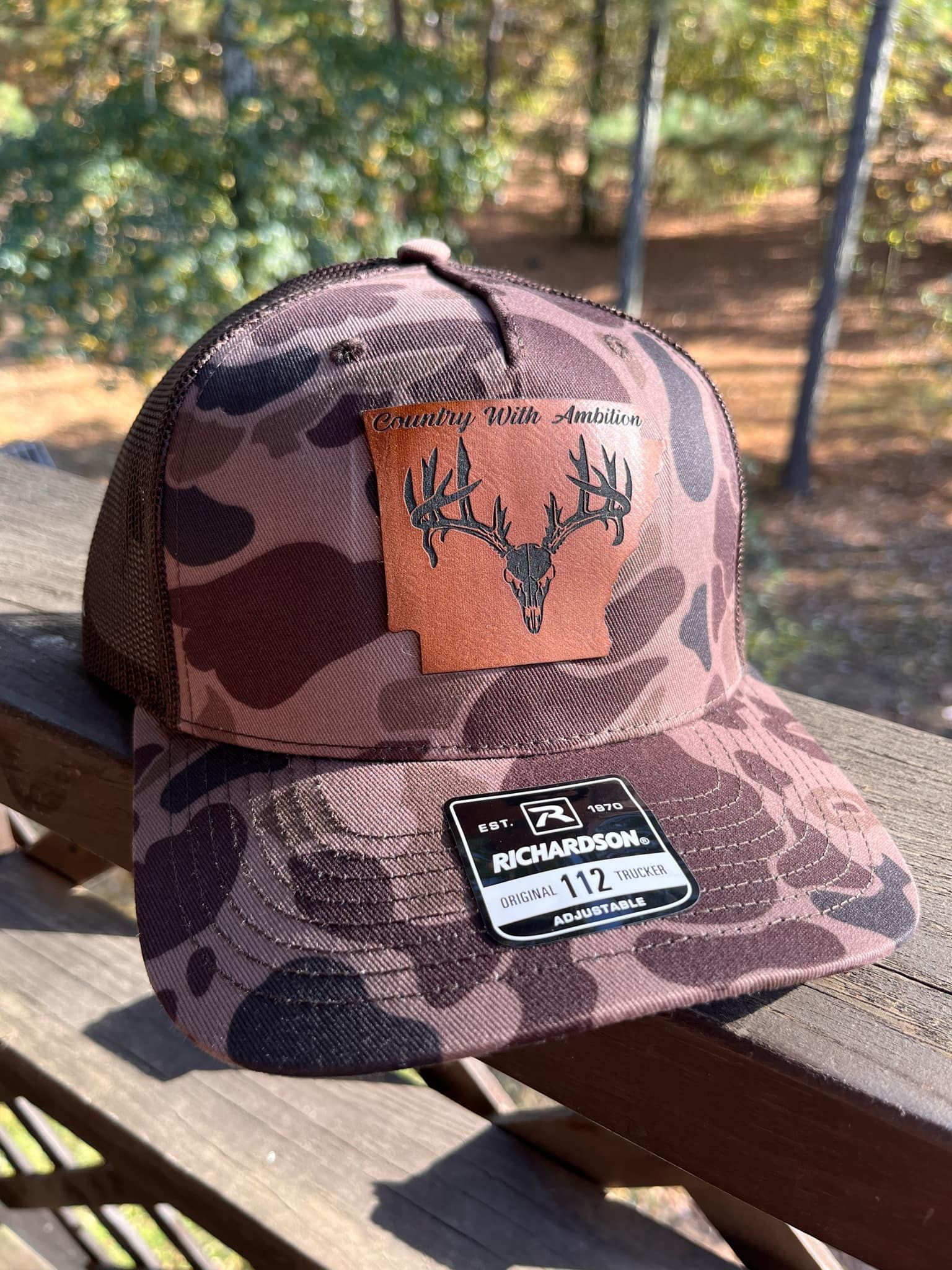 Camo Richardson hat with a leather patch of deer