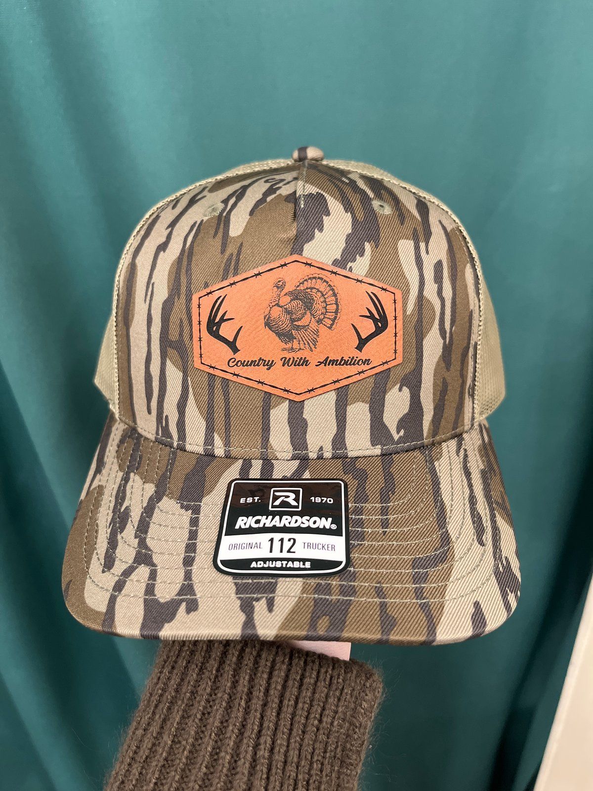 Camouflage Richardson trucker hat with leather turkey patch