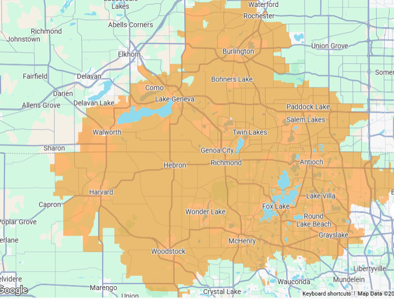 A map showing an orange highlighted service area covering regions surrounding McHenry, Illinois, against a gray background.