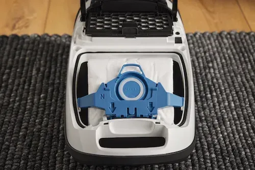 Miele vacuum cleaner bags. A box and two bags are shown, labeled 