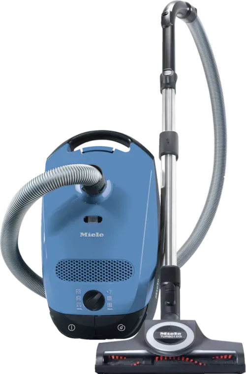 Blue Miele vacuum cleaner with silver hose, wand, and brush head on a white background.