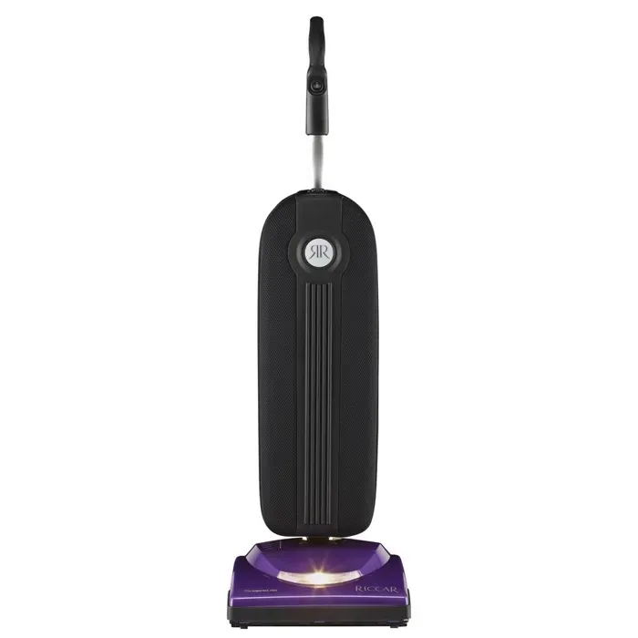Black and purple upright vacuum cleaner with a long handle and a light on the base.
