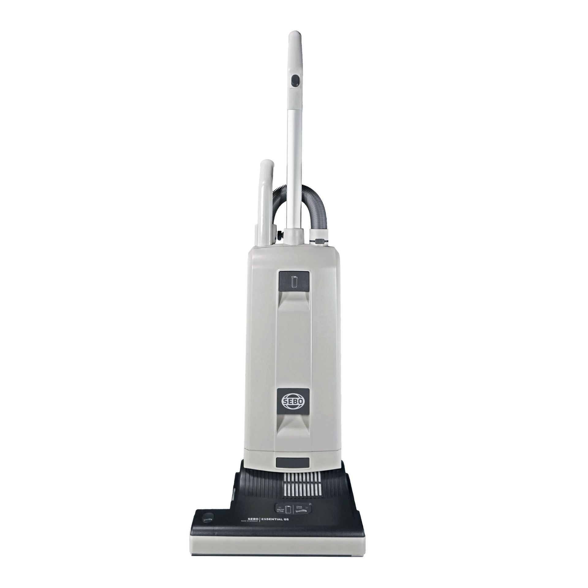Upright beige vacuum cleaner on a white background.