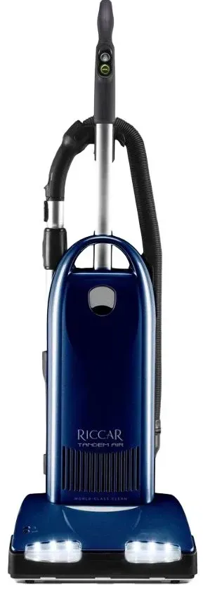 Blue Riccar vacuum cleaner with a long, flexible hose and handle.