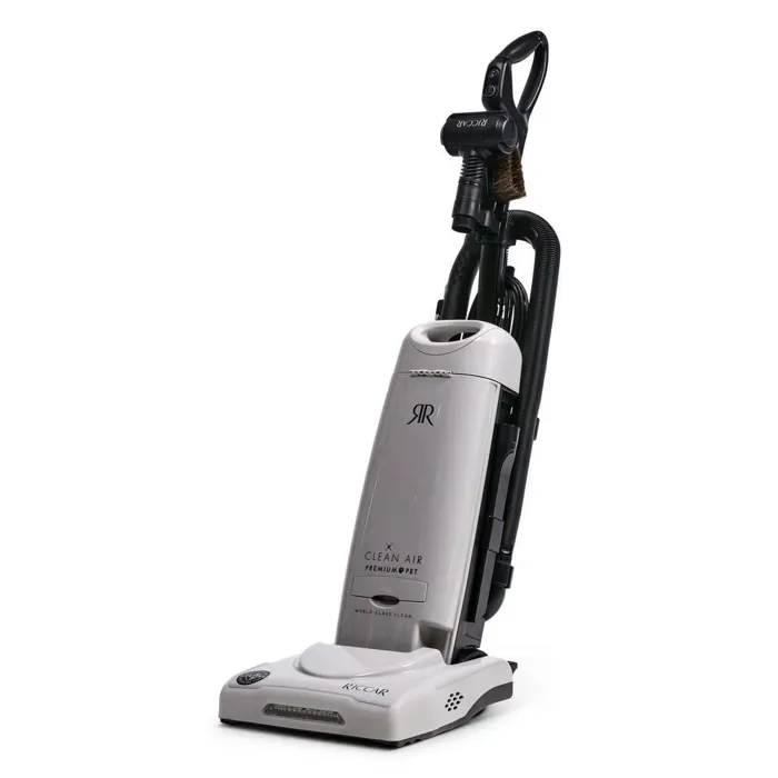 Upright, off-white vacuum cleaner with a black handle, on a white background.