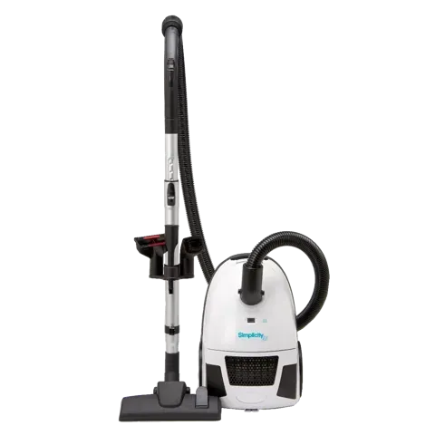 White canister vacuum with black hose and attachments.