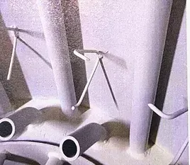 A close up of a white pipe with a purple background.