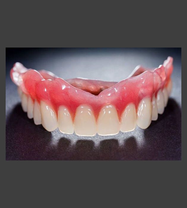 Close Up of a Denture With a Black Background — Cosmetic Denture Services–Jacob Maxwell in Moranbah, QLD