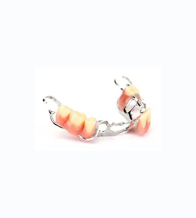 Close Up of a Partial Denture on a White Background — Cosmetic Denture Services–Jacob Maxwell in Mackay, QLD