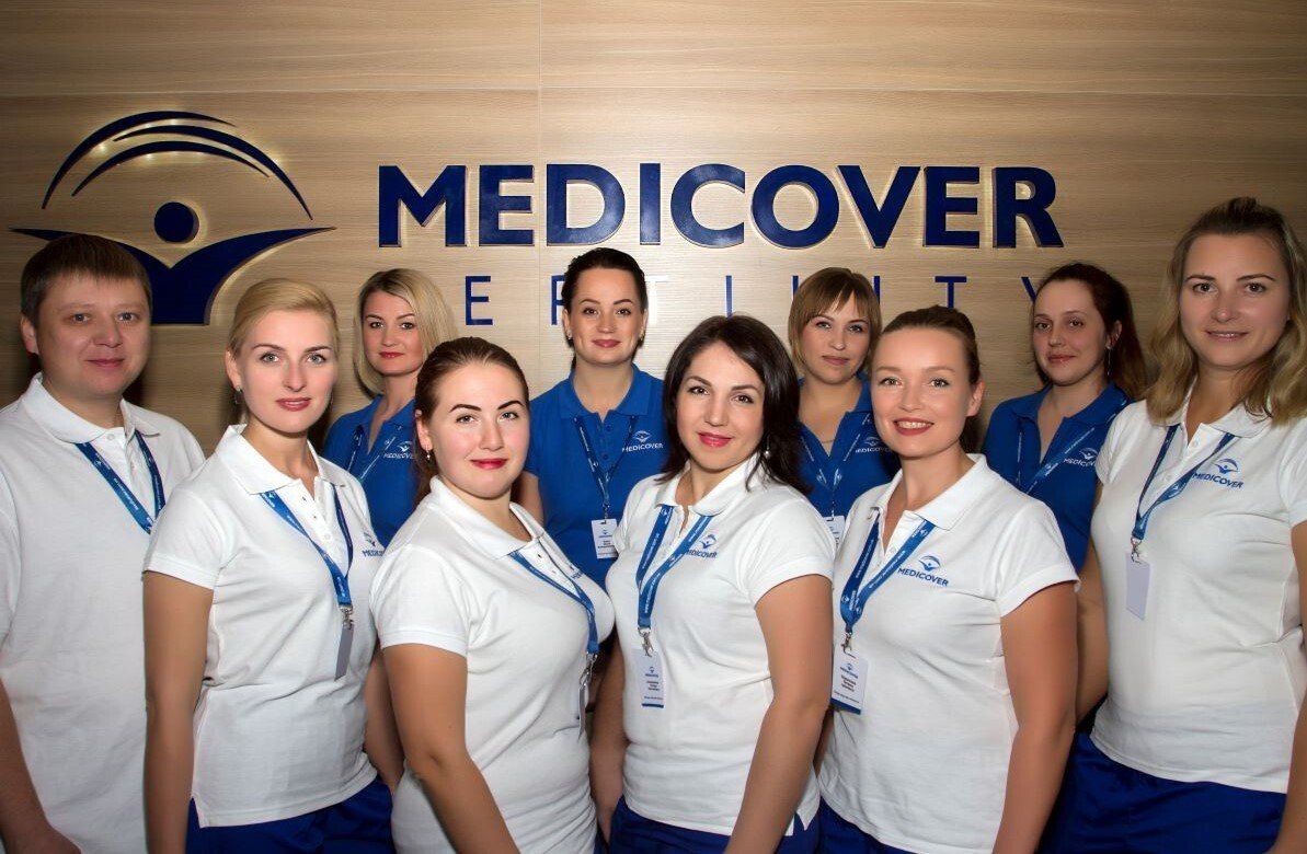 ukrainian medicover fertility team standing together and smiling when looking at the camera