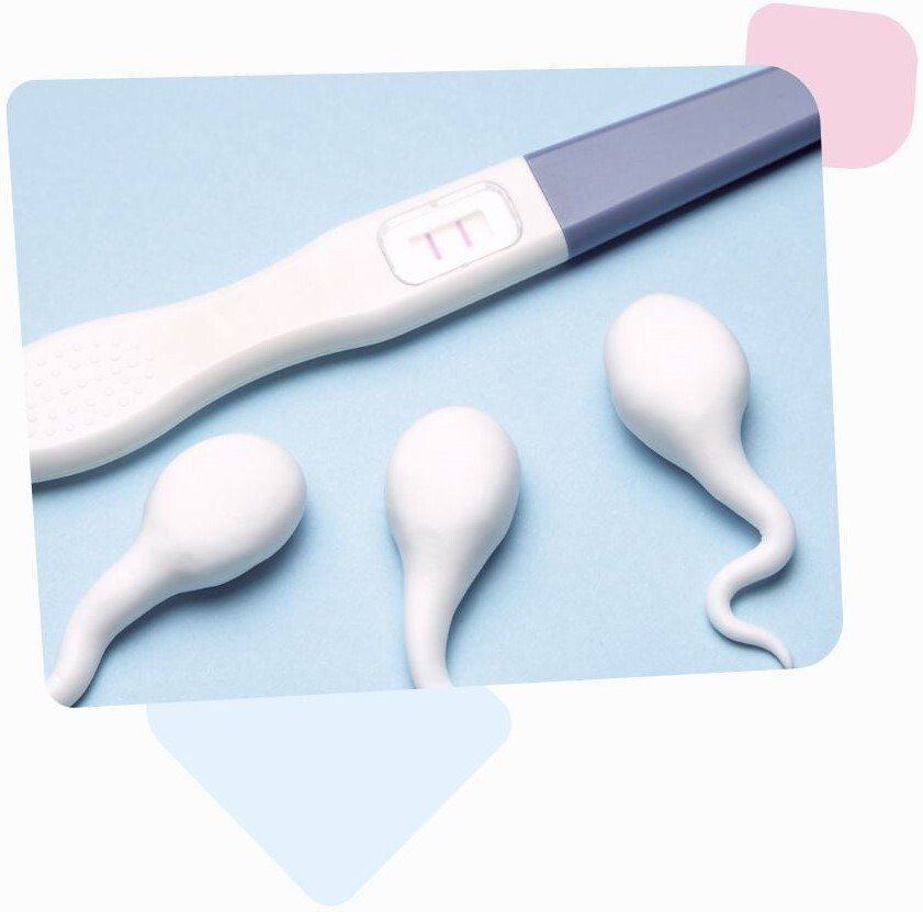 positive pregnancy test on a blue background with three big sperm cells coming to it