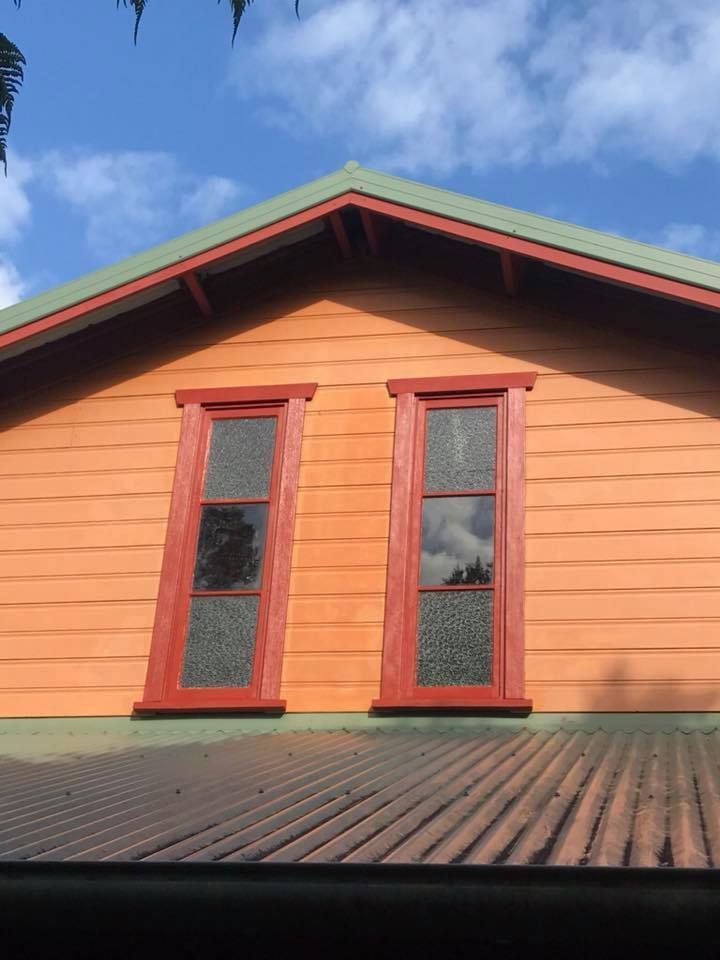 A House With Two Red Windows and a Green Roof — Lennox Build In Lennox Head, NSW