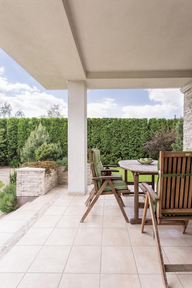 There is a Patio With a Table and Chairs on It — Lennox Build In Wardell, NSW
