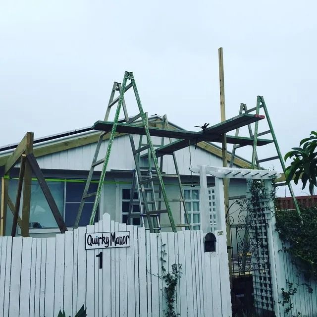 A White Fence With a Sign That Says Quarry Manor — Lennox Build In Lennox Head, NSW