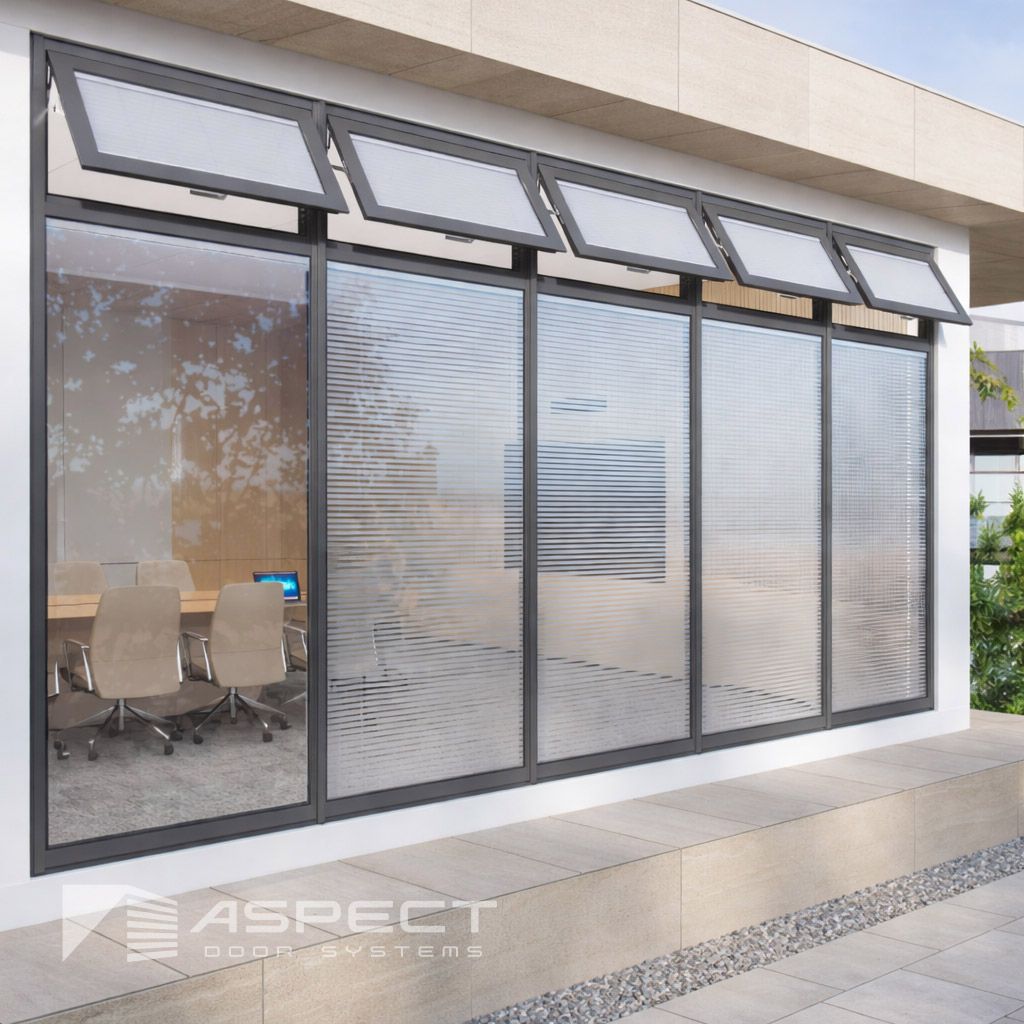 Modern office windows with gray frames and frosted glass — Lennox Build In Lennox Head, NSW