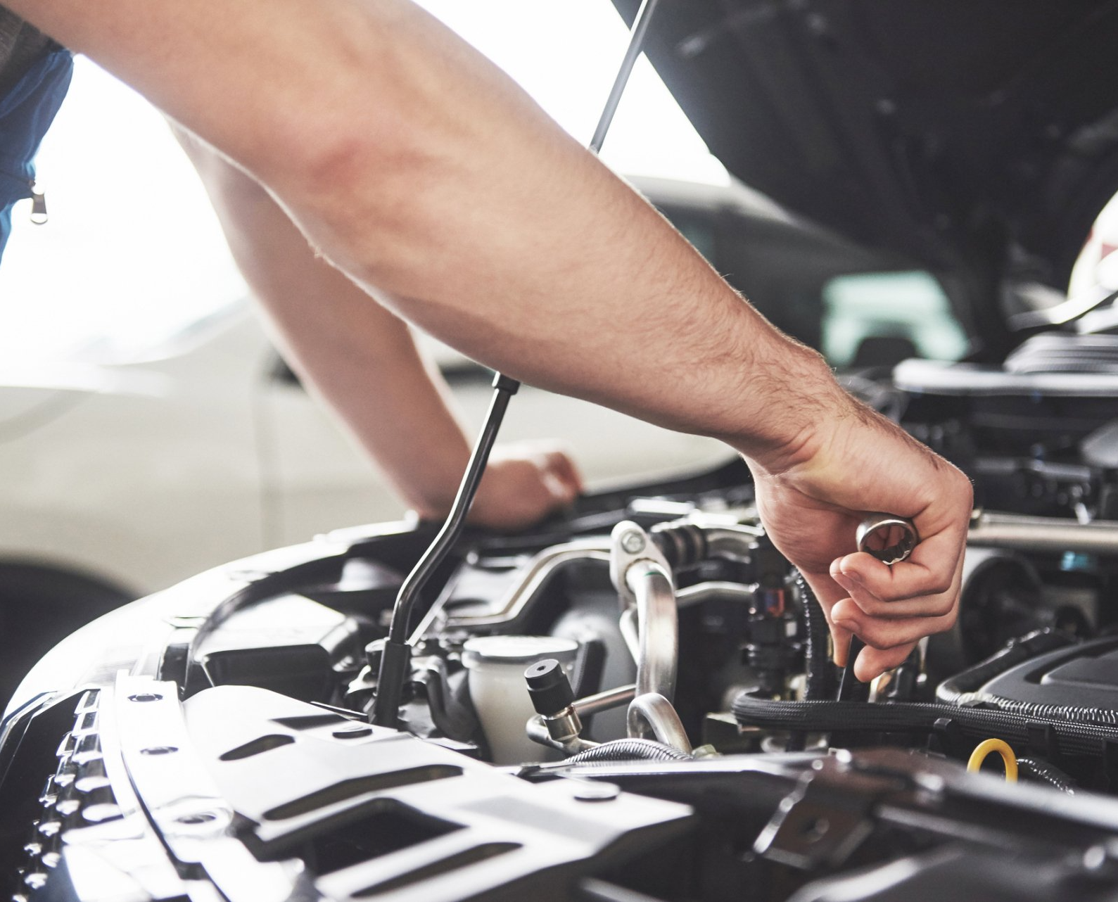 Man Repairing Car | Taylor, MI | Tel-Wick BP