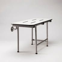 A stainless steel bench with a white top is sitting on a white surface.