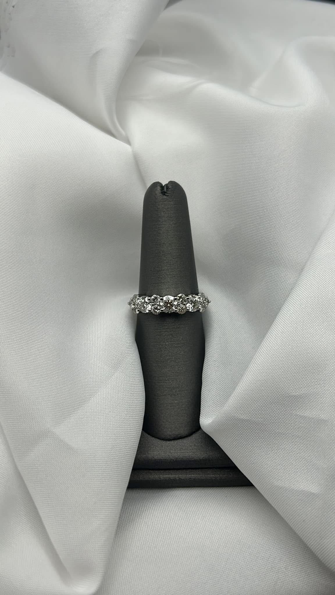 Fancy custom diamond wedding band.