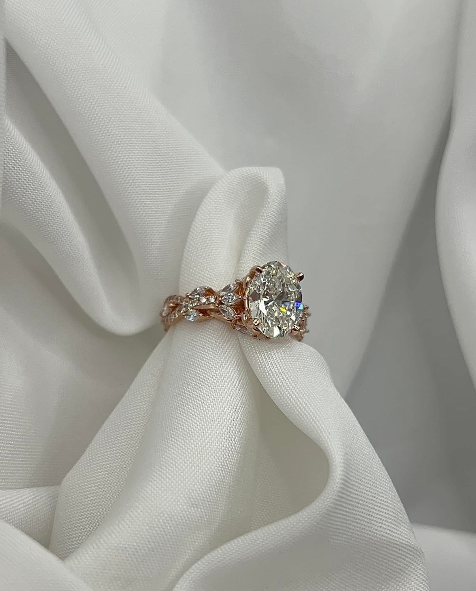 Rose gold Lab grown engagement ring.