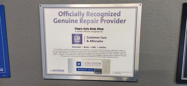 Wall sign reading “Officially Recognized Genuine Provider” with the CertaPro Painters logo. | Tripp's Auto Body