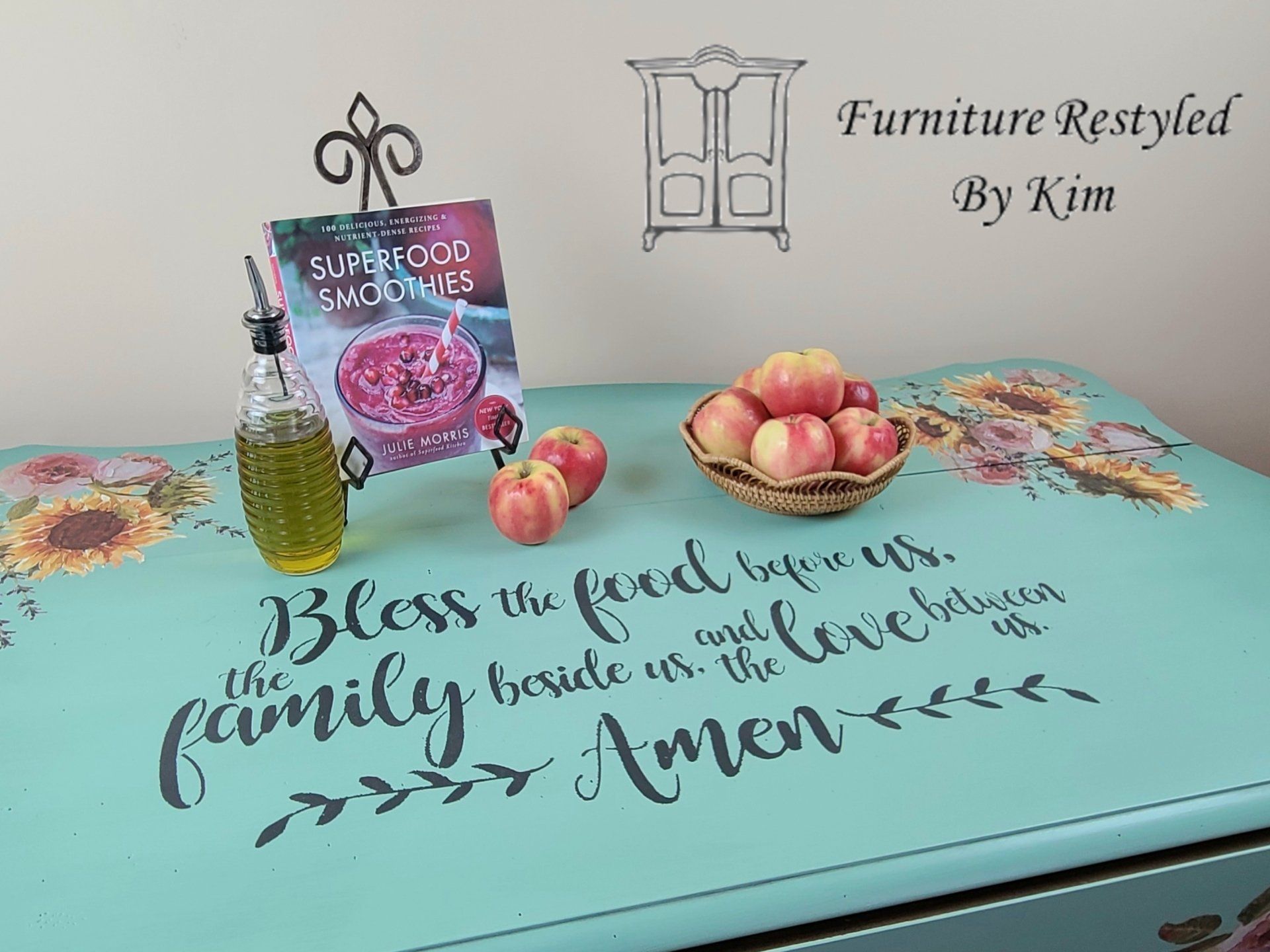 mint-colored table with sunflower paintings and wordings