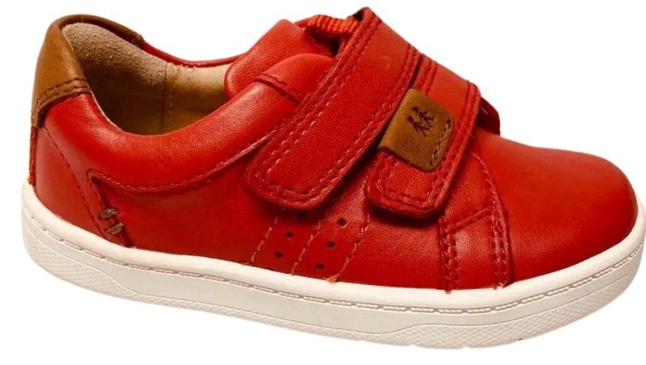 Striking trainer-style shoe in red leather with Velcro to fasten
