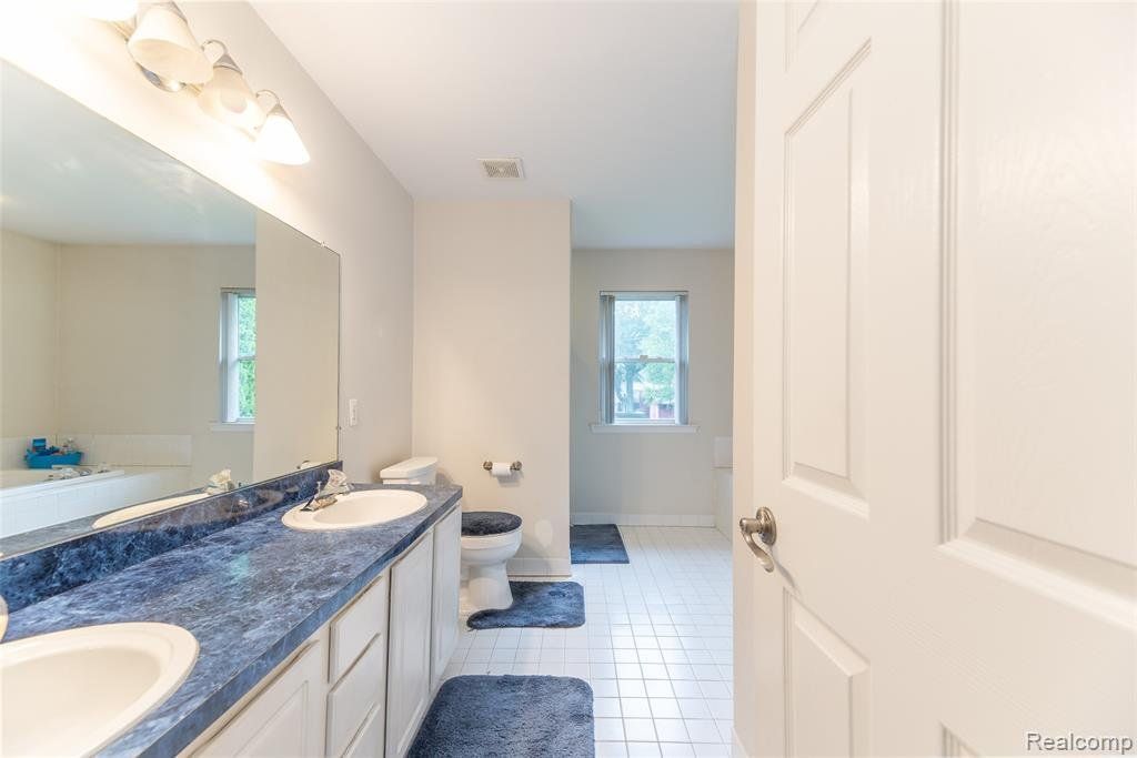 Luxury Cape Cod Master bathroom Taylor MI C Miles Realty