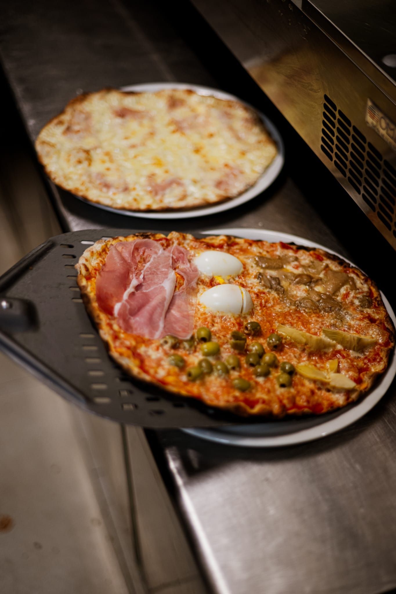 Pizze pronte da servire