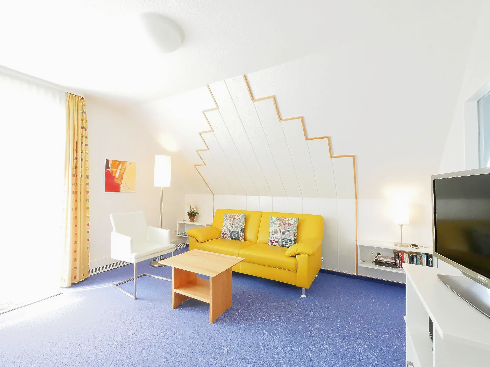 1. Etage , Wohnzimmer mit Westbalkon Appartmenthaus Seestern App.Nr.1 Wohnraum