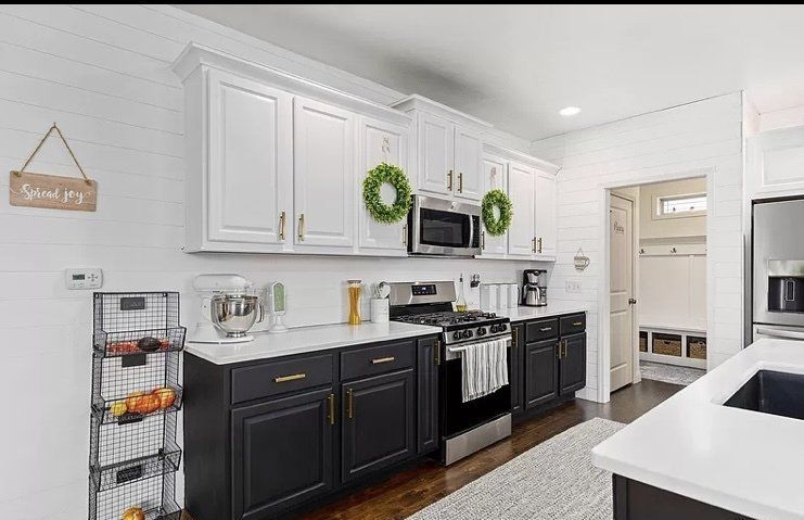 Kitchen Remodel with Black Painted Cabinets and Quarts Countertops