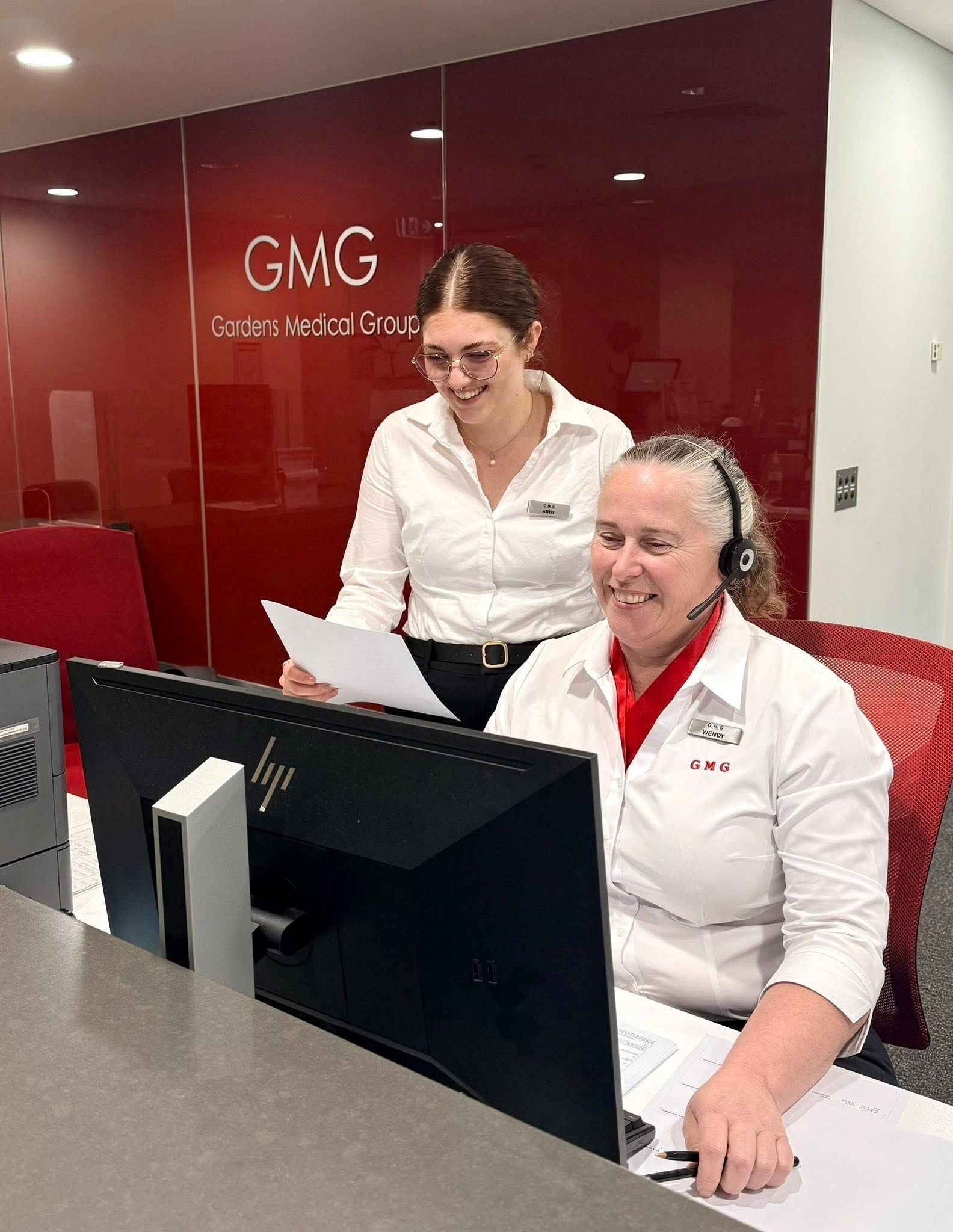 A stethoscope is sitting on a table next to a clipboard.