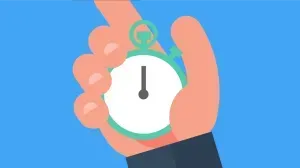 A person is holding a stopwatch in their hand. A person is holding a stopwatch in their hand.