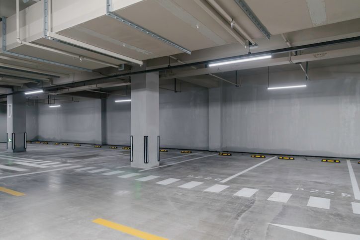 City skyline with various modern high-rise buildings against a clear blue sky.
