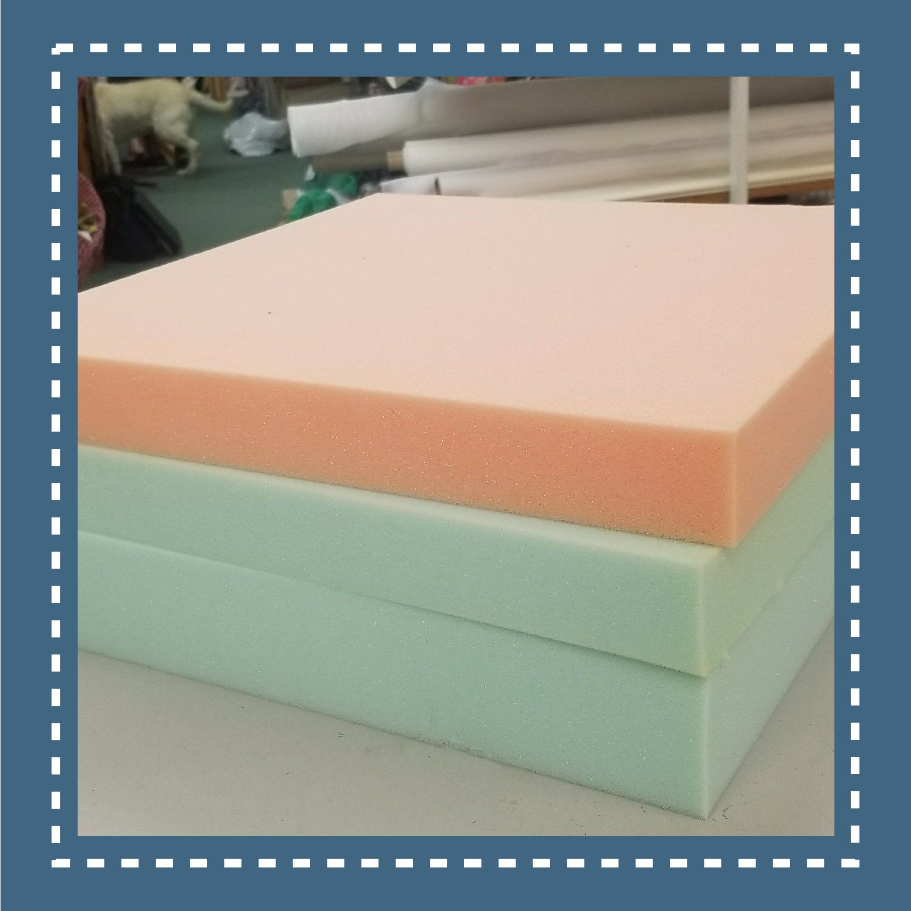 Stack of foam cushion layers: green on the bottom, salmon on top.