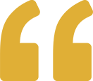 A pair of yellow quotation marks on a white background.
