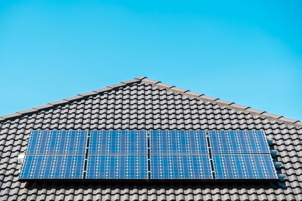 A Solar Water Heater is on the Roof of a House — Burnett Home Energy Centre in Bundaberg Central, QLD