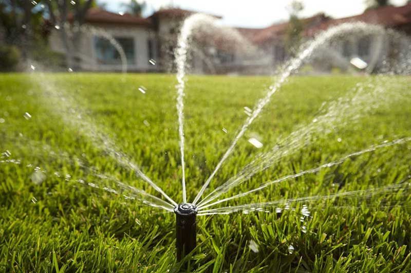 Sprinkler On The Grass — Houston, TX — Mata-Turf, Inc.