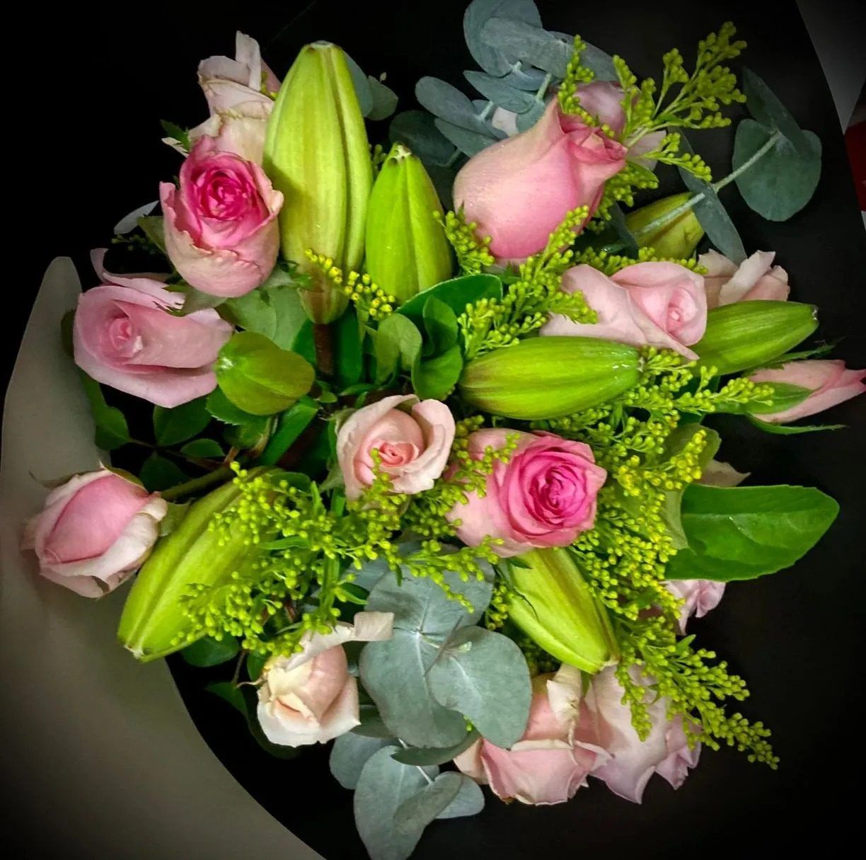 A Close Up of a Bouquet of Pink Roses and Lilies — Wingham Nursery and Florist PTY Ltd In Wingham, NSW