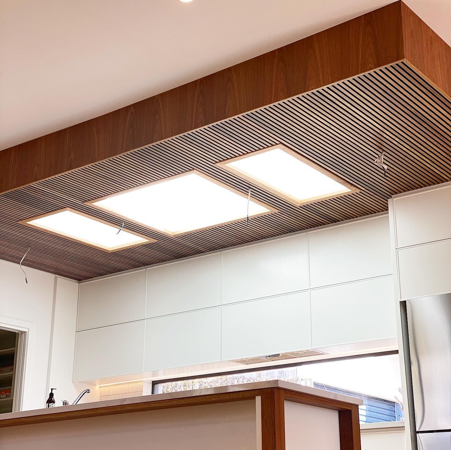 A Ceiling with Lights and A Bar  — Hardwood Projects in Canberra, ACT